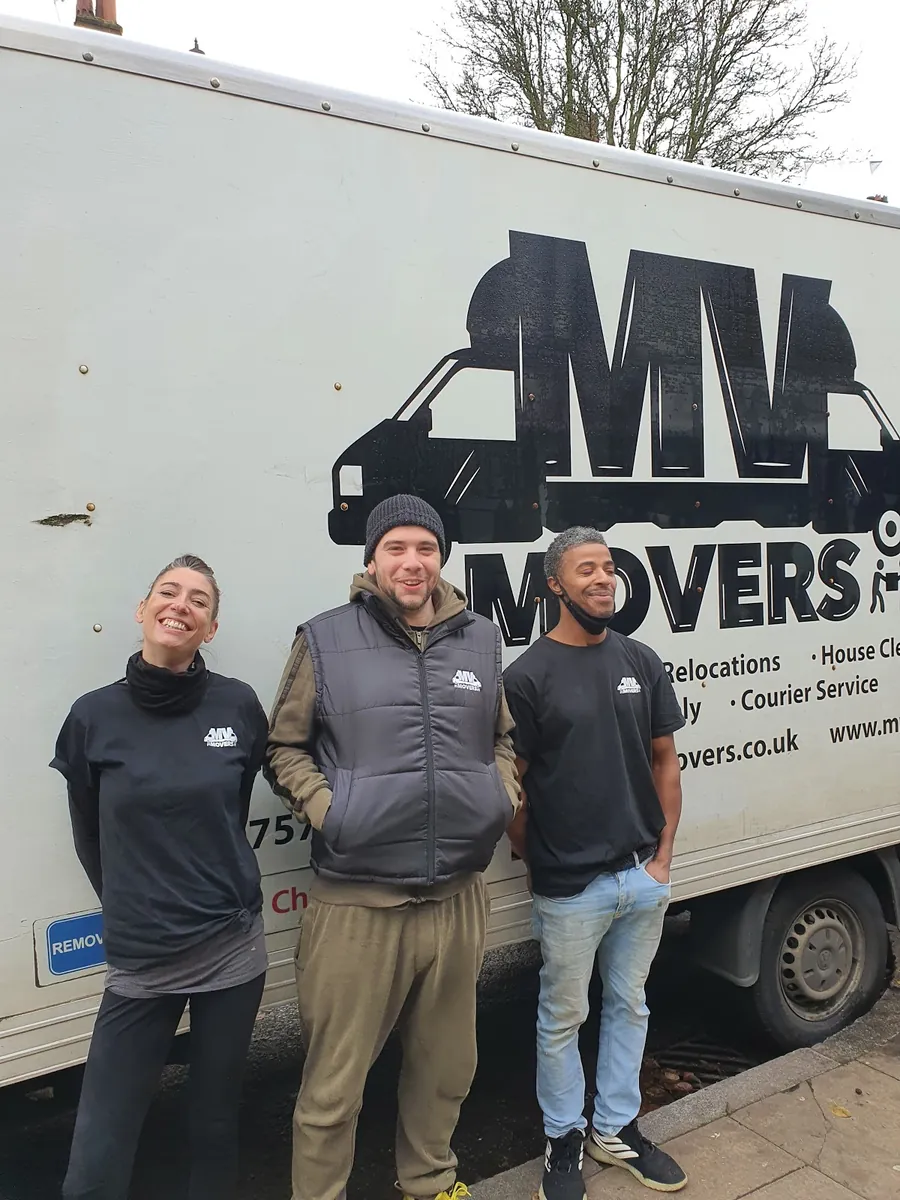 By the van – Three of the regular crew – MV Movers crew